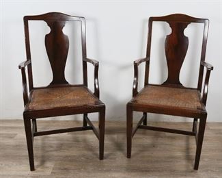 226	Pair of English Chippendale Chairs with Rush Seats	"Pair of English Chippendale chairs with rush seats. English, Late 19th/Early 20th Century. Carved mahogany, wicker rush seats, vasiform splats. Some scratches and wear to legs and stretchers. 

42 1/2"" H x 22"" L x 21"" D"
