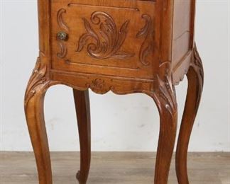 236	19th Century Louis XV Marble Top Nightstand	"19th Century Louis XV marble top nightstand or smoking stand. French, 19th Century. Walnut, red and white marble, cabriole legs with carved acanthus mounts. One drawer, door opens to reveal white marble lined interior. Crack on right and back of piece, wormholing present on back and top of right rear leg, slight wear to feet. 


34"" H x 16"" L x 16"" D"
