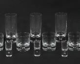 247	38 Pieces Kosta Boda Pippi Glassware	"38 pieces of Kosta Boda glassware in the pattern Pippi. Circa mid 20th century. Unmarked. 12 Old fashioned, 13 shot glasses and 13 highball glasses. 
Highball glass: 7""H.
"