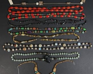        323	Grouping of Natural Jewelry	"Grouping of natural necklaces. Hardstone, glass and colored stones. 
1 necklace: 19 1/2"" length."