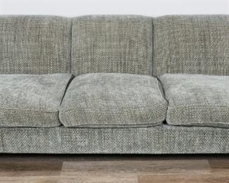        355	Contemporary Upholstered Carlyle Style Sofa	"Contemporary upholstered Carlyle style sofa. 21st Century. Seafoam upholstery with seriated block pattern, three cushions, front feet on casters. Some minor wear to front feet.

30"" H x 84"" L x 35"" D"