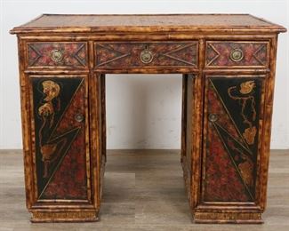        359	Victorian Chinoiserie Bamboo Pedestal Desk	"Victorian Chinoiserie bamboo pedestal desk. English, Late 19th Century. Woven reed top and sides, three dovetailed drawers, lacquered Chinoiserie front, brass medallion pulls. Isle of Man maker's mark on lock plate in central drawer. Center bamboo rail previously repaired. Some slight wear to weaving on back and left side of pedestal. 

30"" H x 38"" L x 19"" W"
