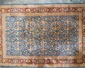        366	Room Size Handmade Indian Rug	"Room size handmade rug. Made in India label. Repeating floral and vegetative motifs, 10 central medallions. Furniture wear throughout. 18'2"" x 12'

"