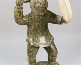        377	Carved Granite Inuit In Style Of Pauta  Saila	"Carved granite Inuit in style of Pauta Saila. Signed on the underside 
15 1/2"" x 7 3/4""."