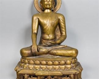        387	Shakyamuni Bronze Buddha Statue	"A bronze statue of Shakyamuni or Gautama Buddha. 
Shakyamuni seated on a lotus atop a stepped lion throne, his right hand touching the ground, the left one cupped in the gesture of meditation.
Marked India on verso.
Repairs to the back of the head and right arm.
11"" L x 6 1/2"" W 16 1/2"" H .
"