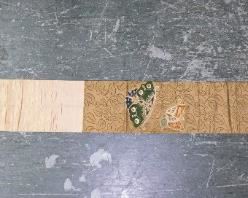        395	Japanese Silk Obi	"Japanese pink silk obi with embroidery.
139 1/2""L x 12"" W."