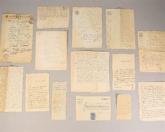        421	17th, 18th & 19th Century French Documents	Group of 17th, 18th & 19th century handwritten French documents and letters. Most with government stamps and seals. Wear, discoloration and tears to paper throughout.