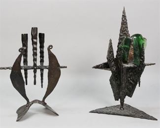        437	Manner of Shlomo Gabbai 2 Brutalist Sculptures	"Manner of Shlomo Gabbai (Israeli) 2 brutalist sculptures. Wrought iron candelabrum and composition with desert glass. Unsigned. 
Tallest sculpture: 14"" H."