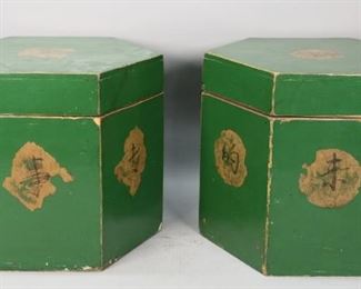        438	Pair of Chinese Export Tea Canisters	"Pair of green lacquer Chinese export tea canisters. Character to each panel. 13 1/2"" H x 15 1/2"" W. Wear to paint along the edges, loss to paint, crack along the top of both lids. 
"