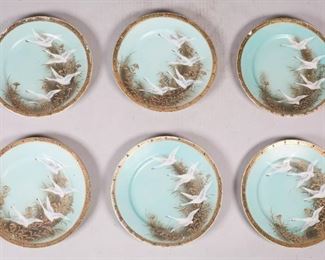        445	6 20th Century Japanese Porcelain Plates	"6 Mid to Early 19th Century Japanese porcelain plates with enamel decoration.  Marked on the underside with three leaf mark ""Hand Painted Made in Japan"". Gifu Prefecture circa 1921-1941. Wear to gilt on rim. 
7 1/4"" Diameter."