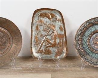        446	Israeli Repousse Copper Chargers and Plaque	"2 copper repousse chargers and 1 plaque. Plaque with Hebrew label on verso. Chargers: 13 3/4"" diameter. Plaque: 15 1/4"" x 10 1/2"".
"