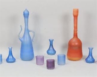        451	15 Pieces Neker Studio Glass Israel	"15 Pieces Neker Studio Israel glass. Ewer with stopper. 5 small glasses, 1 short vase, 1 tall vase, 5 small vases. Neker studio glass Israel label to the underside. Tallest vase: 12 1/2""H. Chip to ewer stopper tip. 


"