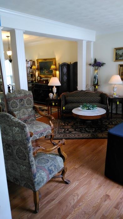 Carved wood arm chairs, settee with marble top table. drop leaf side tables with alabaster marble lamps, 20" porcelain vase with iris decoration, carved wood plant stand