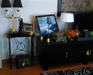 Marble top table with sewing machine base, double light table lamp, original paintings, 6' entertainment cabinet, MCM table lamp