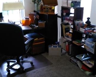 Office desk, swivel chair, office supplies