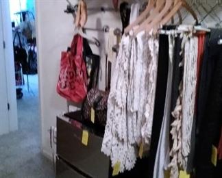 Some of the linens, hats and the refrigerator