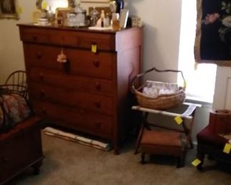 3 over 4 drawer chest with various perfume and cologne bottles, luggage rach