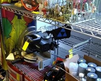Delta Shop Master miter saw, storage cabinet units on wheels, etc.