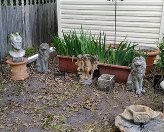 Garden terracotta and concrete statuary and plants