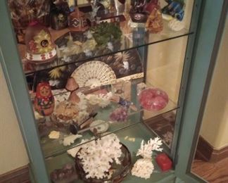 Curio cabinet with many beautiful items