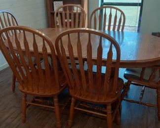 Nice oak dining table with six chairs