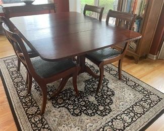 . . . a beautifully kept Duncan Fife table and six chairs