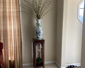 wooden stand   oriental vase with arrangement 