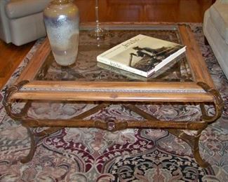 Unusual iron belt like straps on table