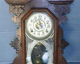E. Ingraham Co Carved Wood Hanging Wall Clock, 29" x 13.5" x 4"