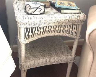 White wicker side table with shelf