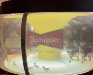 Available for pre-sale ~ $900. Budweiser Clydesdale Parade Rotating Carousel Light Lamp Beer Bar Vintage - ((Sold on eBay Sep, 13th 2019 for $2,000.00!!))
This item is an authentic 1960's Budweiser Clydesdale Carousel Light. It rotates all the characters in a circle while lit. 
This piece lights and rotates, however there is a short somewhere in the original cord—on original chain. It was also found in the attic and is in need of a good cleaning which is why we have it marked lower.
Call or text Lisa @ 615-854-8535