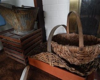 Old baskets from another time, egg basket container and  can.