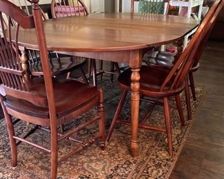 Table and six chairs in excellent condition (table pads were used)