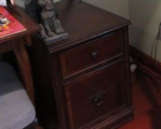 Two drawer cabinet. This house has nice accent furniture.