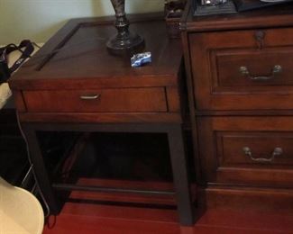 Single drawer table. This house has nice accent furniture.