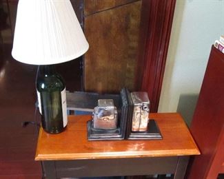 single drawer accent table. Camera bookends, wine bottle lamp