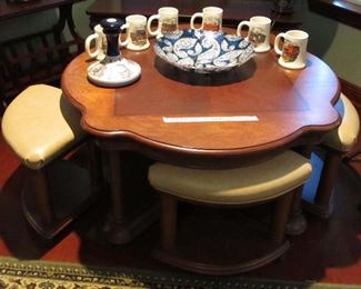 Can be raised to Bistro height. Takes two people to accomplish that. you have to twist and lift