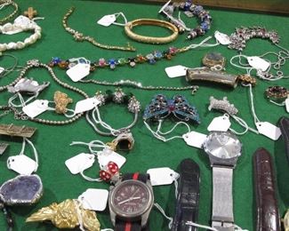 Don't let the poor images dissuade you from looking at the costume jewelry. There is some nice sterling silver and some nice Swarovski.