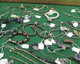 Don't let the poor images dissuade you from looking at the costume jewelry. There is some nice sterling silver and some nice Swarovski.