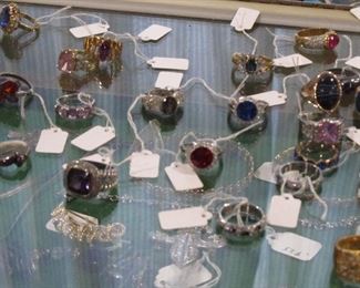 Don't let the poor images dissuade you from looking at the costume jewelry. There is some nice sterling silver and some nice Swarovski.