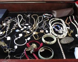 Don't let the poor images dissuade you from looking at the costume jewelry. There is some nice sterling silver and some nice Swarovski.
