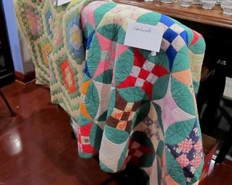 two handmade quilts, one antique
