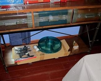 very interesting table has metal drawers, also wall mount for TV