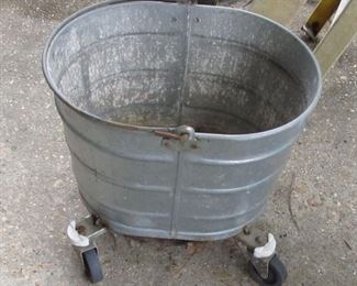 Galvanized bucket on wheels. very heavy