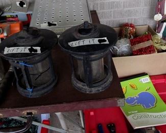 iron outdoor candle holders.