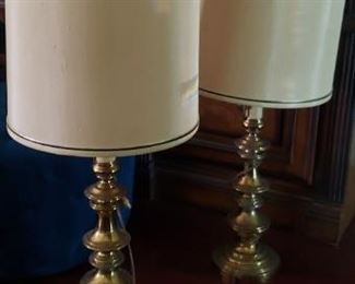 Pair of 1960's brass lamps with original shades. 