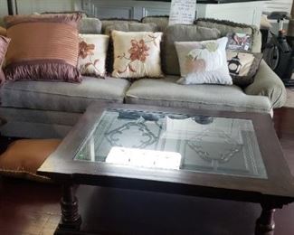 Solid wood Norwalk coffee table with glass top and decorative onlay