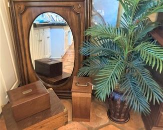 Framed wooden mirror; variety of wooden boxes; artificial plant