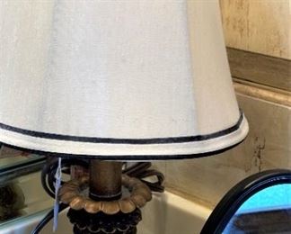 Small lamp; oval mirror