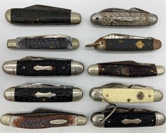 Various vintage pocket knives including Ka-Bar and Cub Scout knives